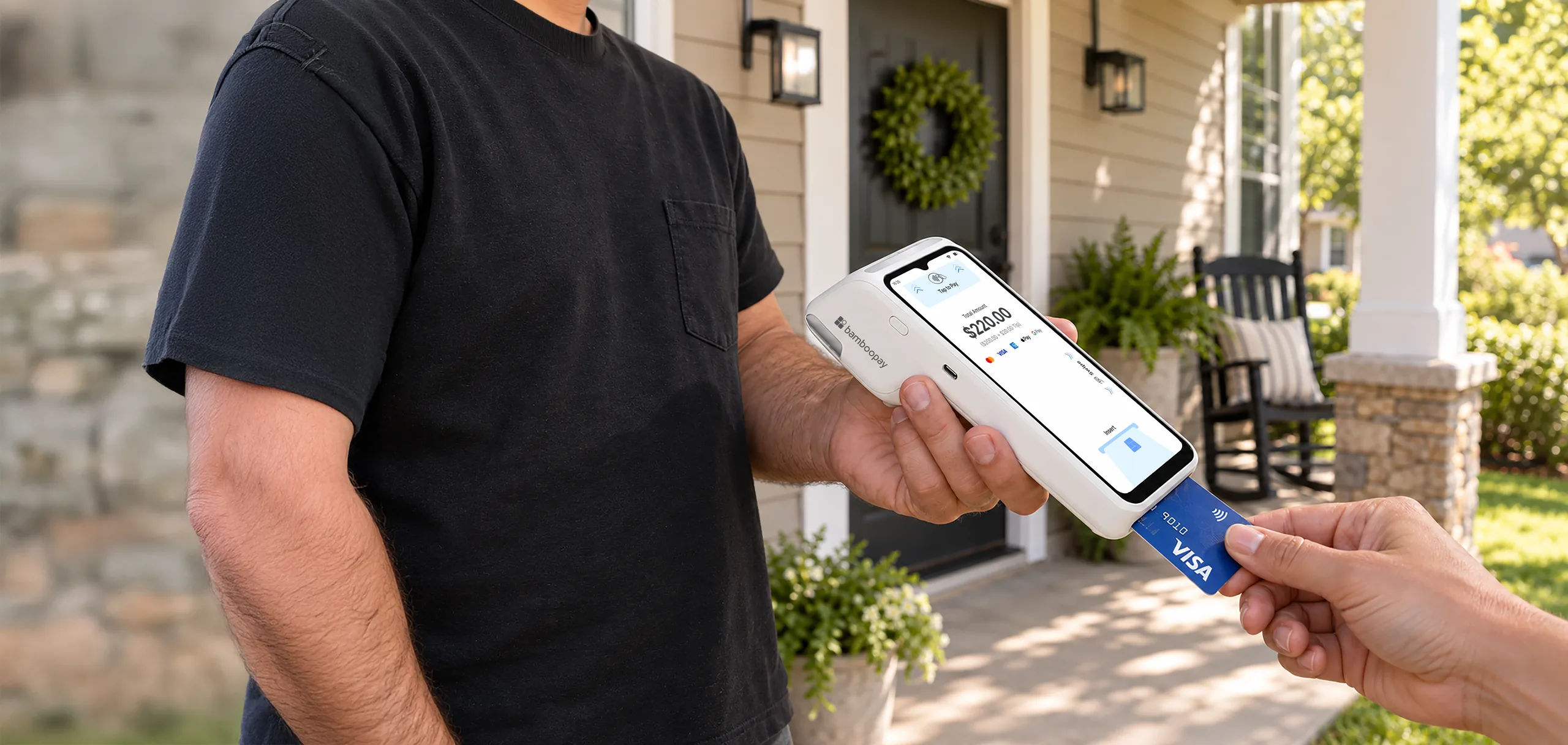 Customer tapping a card on a Go POS handheld at their own front door